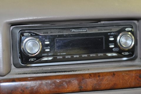 1996 Ford Bronco - Close-up of a Pioneer car stereo unit installed in a vehicle's dashboard.