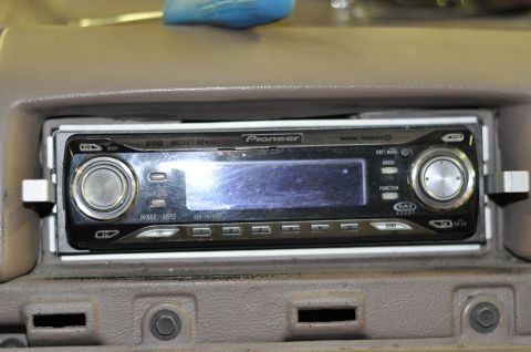 1996 Ford Bronco - A Pioneer car stereo with a digital display is mounted in the dashboard of a vehicle.