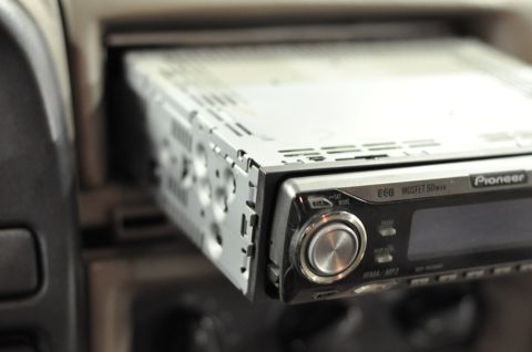 1996 Ford Bronco - Close-up of a Pioneer car stereo unit installed in a vehicle dashboard.
