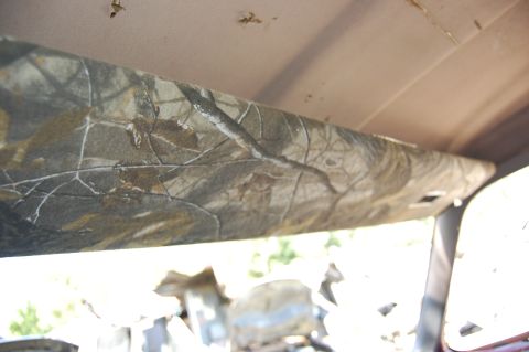 1994 Ford Bronco - Interior view of a vehicle's headliner, covered in a camouflage pattern.