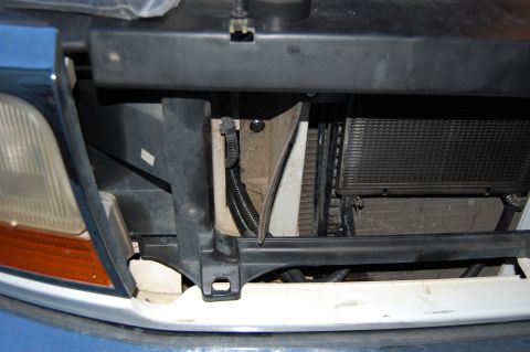 1994 Ford Bronco - Cooler hoses run through holes drilled in the rubber air dam and an existing hole in the core support. Hoses are wrapped in wire loom to pr…