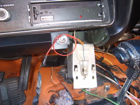 1973 Ford Ranchero - Wiring under the dash of a 1973 Ford Ranchero, near the radio and shifter assembly.