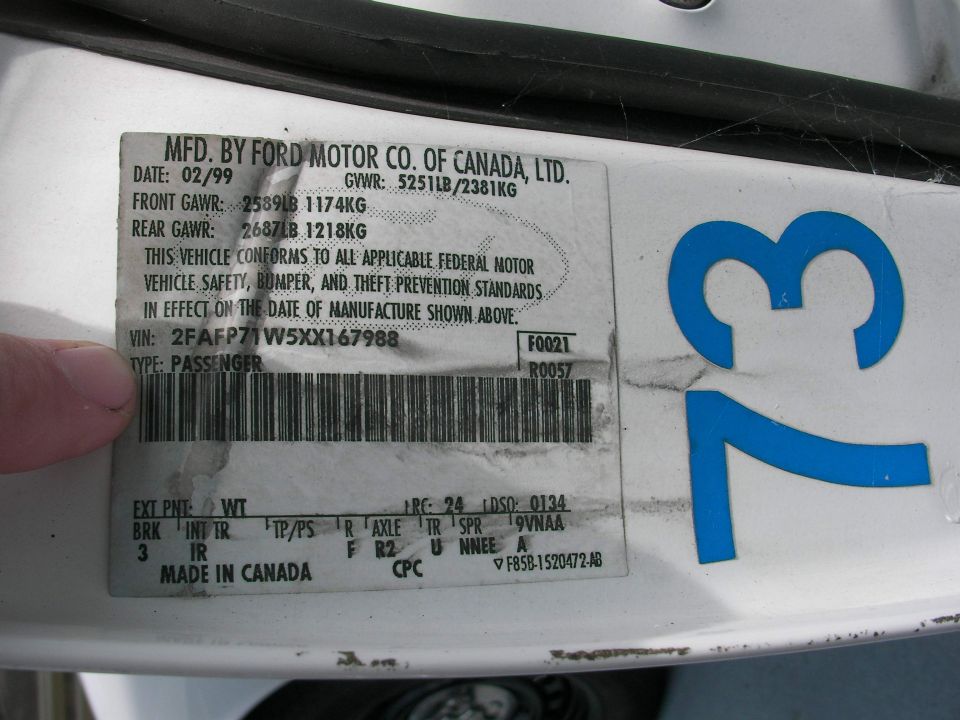 Ford Motor Co. of Canada door label dated 02/99 with GAWR ratings and vehicle codes