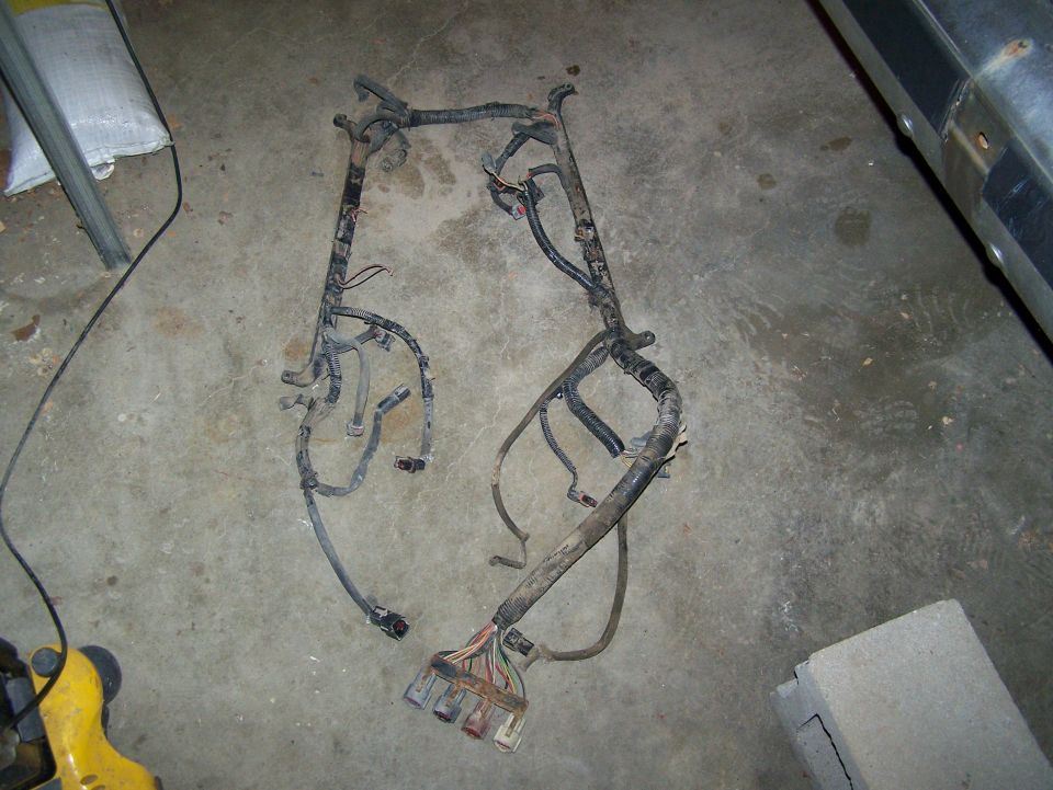 Vehicle wiring harness laid out on a concrete floor