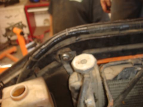 Engine bay components with Supermotors.net logo