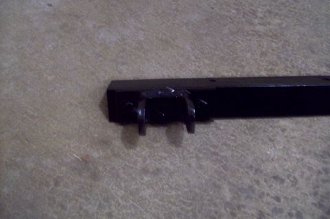 2006 Ford Fusion - Close-up of a tow hitch receiver bracket, likely for a vehicle.
