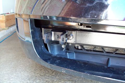 2006 Ford Fusion - Tow hitch bracket mounted to the front bumper of a 2006 Ford Fusion.
