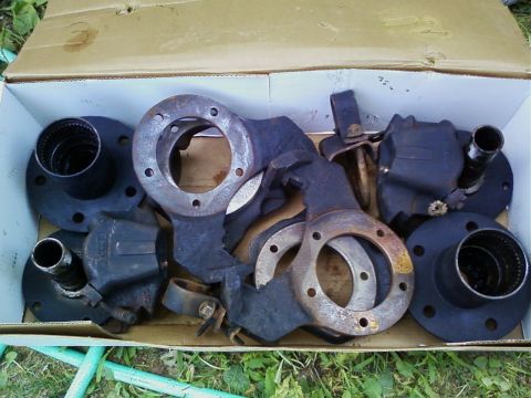 1990 Ford Bronco - Spindles, hubs, rotors, calipers, and brake mounting brackets.