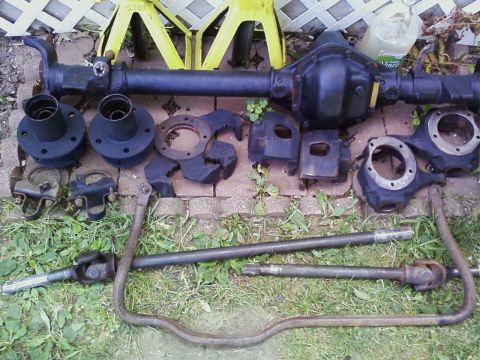 1990 Ford Bronco - Spindles, hubs, rotors, calipers, and brake mounting brackets.