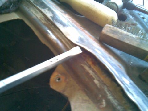 1972 Ford Ranchero - I lifted the rolled over top edge for better access to lift up on the rest of the welds. it was easy to roll it back down after the lower w…