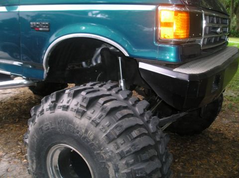 1978 Ford Bronco - This lifted truck features aggressive off-road tires and a prominent front bumper, suggesting it's built for terrain.