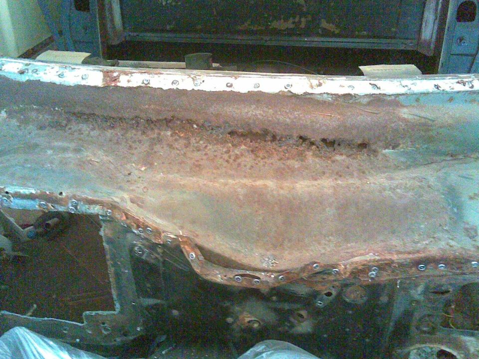 a lot of perforated rust along the whole bottom panel of the cowl, or what they called 'the Pillow' on the assy line because the top & bottom panels were already together when they set it in place. story is that the pillow wasn't even painted inside or out, I didn't find any evidence that it was