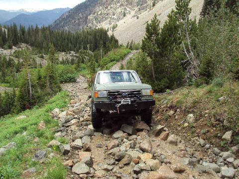 1989 Ford Bronco - This 1987 Ford F-250 navigates a challenging rocky trail in the mountains.