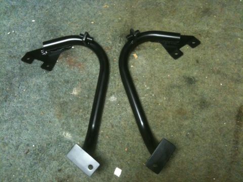 1995 Ford Bronco - A pair of newly painted brackets are ready for installation.
