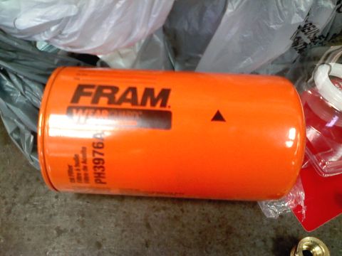 1990 Ford Bronco - An orange FRAM oil filter, part number PH3976A, is shown in this image.