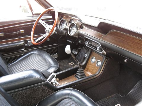 1968 Shelby GT500 - Interior view of a 1968 Shelby GT500, highlighting the dashboard, steering wheel, and shifter console.