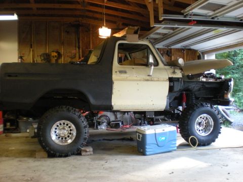 1978 Ford Bronco - This 1978 Ford Bronco is in a garage, appearing to be in the middle of a repair or restoration project.