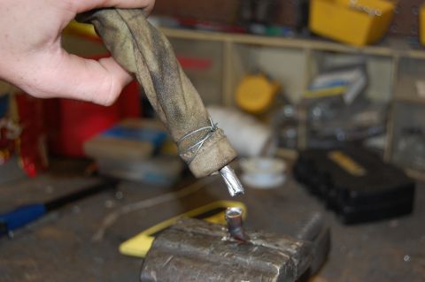 1994 Ford Bronco - Inserting the cable into the lug. this is done while heating the lug.