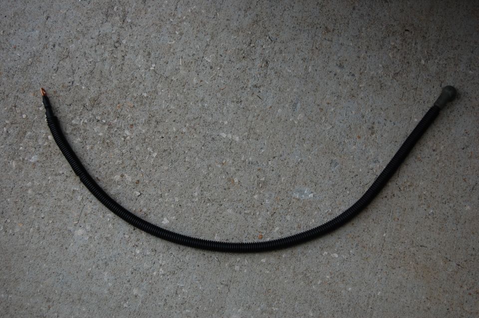 Completed charge cable. dielectric grease and 2 layers of heat shrink on both ends. cable wrapped in wire loom and boot installed.