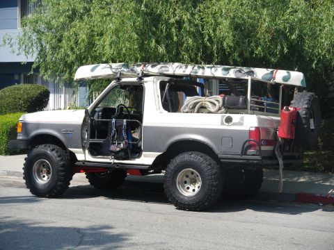 1991 Ford Bronco - This modified Ford Bronco is equipped for an outdoor adventure with a canoe and gear loaded up.