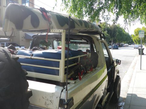 1991 Ford Bronco - This Ford Bronco is loaded up with a canoe and camping supplies, ready for an adventure.