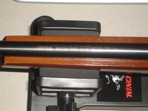 1989 Ford Bronco - Close-up of a Stevens Arms Model 157 rifle barrel, indicating it is chambered for .22 Long Rifle ammunition.