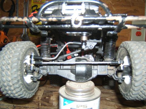 1988 Ford Bronco - The underside of a remote-controlled crawler shows its suspension, axles, and drive components.