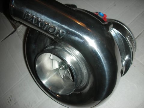 1992 Ford Crown Victoria - A polished Paxton supercharger is shown, its impeller and prominent branding, likely for an engine rebuild.