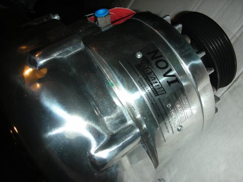 1992 Ford Crown Victoria - Close-up of a Paxton Novi supercharger, part number D-156-1, with a drive pulley attached.