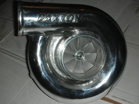 1992 Ford Crown Victoria - A polished Paxton supercharger is shown, highlighting its impeller and branding.