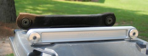 1976 Ford Ranchero - Comparison of an old suspension part and a new silver aftermarket suspension part with 'AIR RIDE' branding.