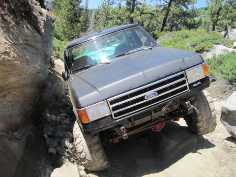 1989 Ford Bronco - This 1989 Ford Bronco is shown navigating a challenging rocky off-road course.