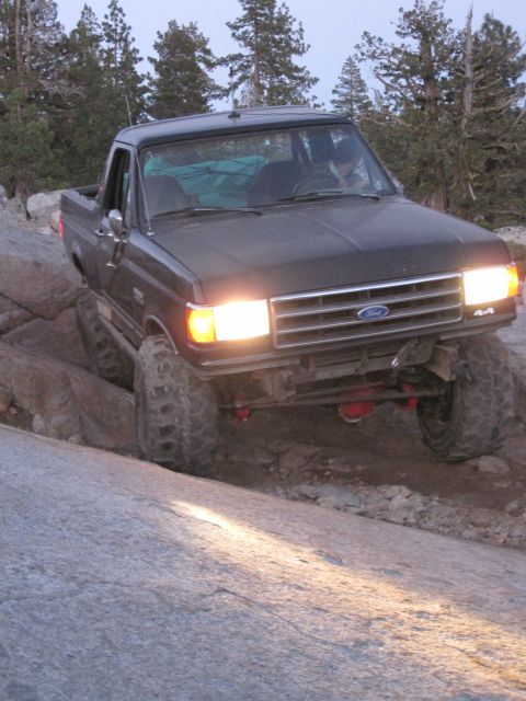 1989 Ford Bronco - This modified 1987 Ford F-150 pickup truck is shown tackling a challenging rocky trail.