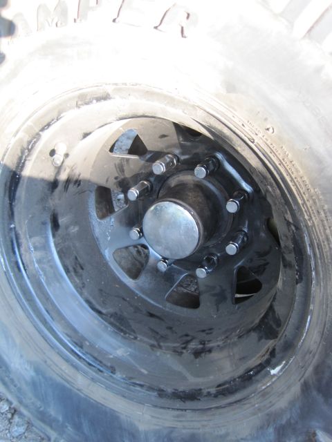1989 Ford Bronco - Detail of a wheel hub and tire, not a 1989 Ford Bronco.