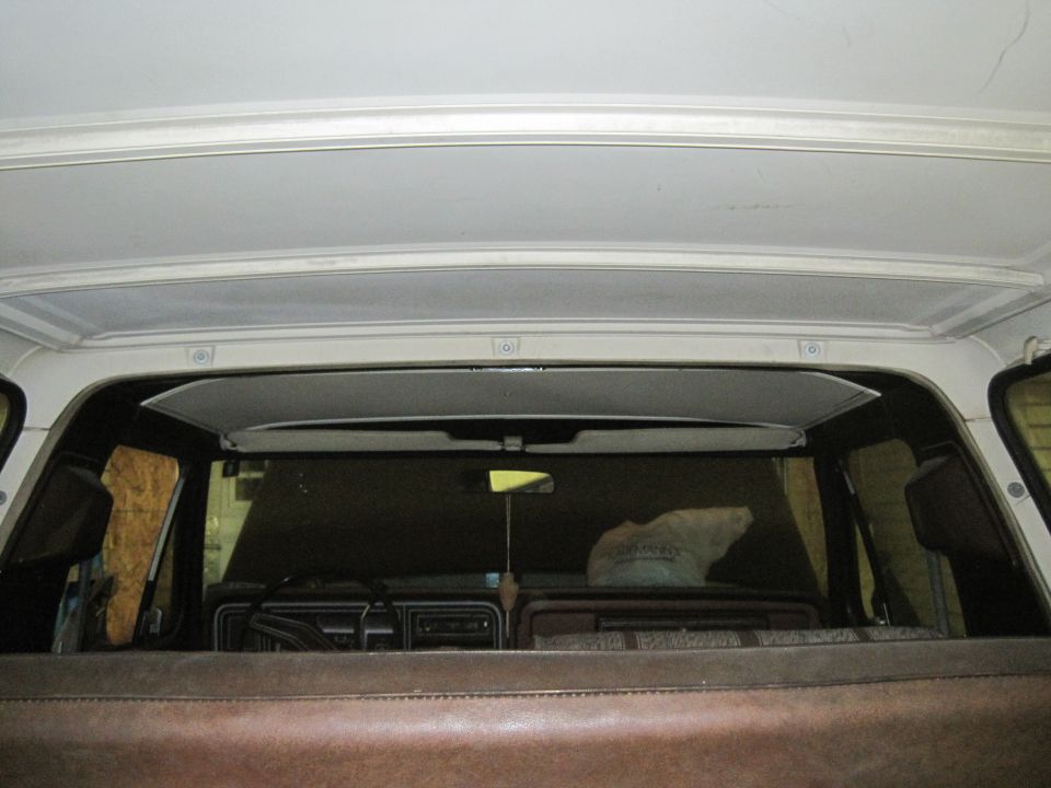 1979 Ford Bronco interior showing dashboard, seats, and headliner