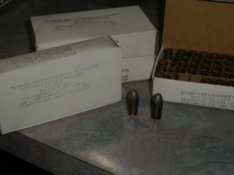 1996 Ford Bronco - Boxes of custom loaded .45 ACP cartridges from Everts Reloading Co. are shown with two loose cartridges.