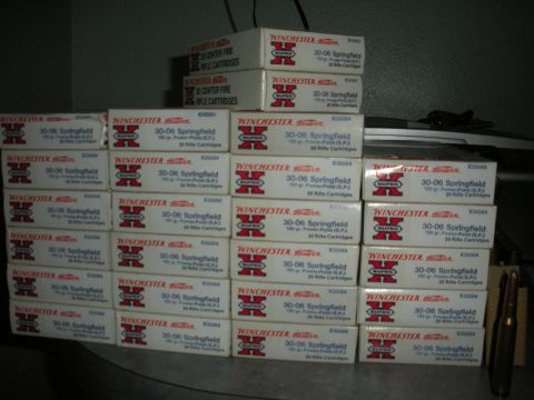 1996 Ford Bronco - Numerous boxes of Winchester 30-06 Springfield ammunition are piled up.