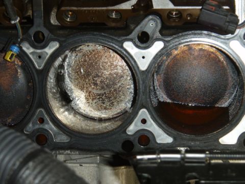 2006 Dodge Charger - This image shows the inside of an engine's cylinders, revealing significant wear and tear.