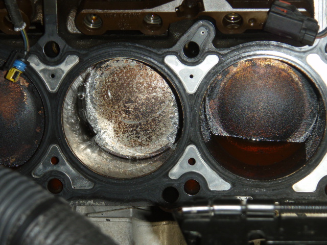 Engine block deck with cylinder bores and head gasket removed