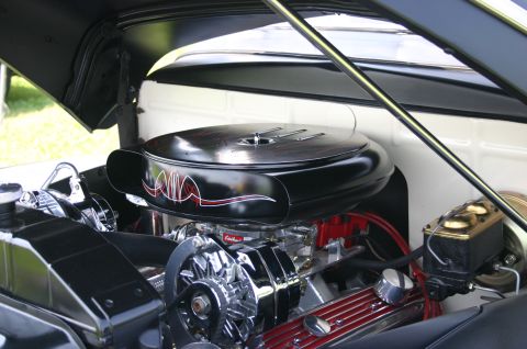 1968 Shelby GT500 - Close-up of a custom engine bay, highlighting a black air cleaner with red pinstripes and polished chrome parts.