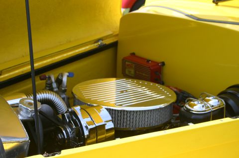 1968 Shelby GT500 - Close-up of a yellow engine bay a chrome air filter and an MSD ignition box.