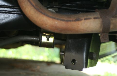 1976 Ford Ranchero - Vehicle suspension part and exhaust pipe detail.