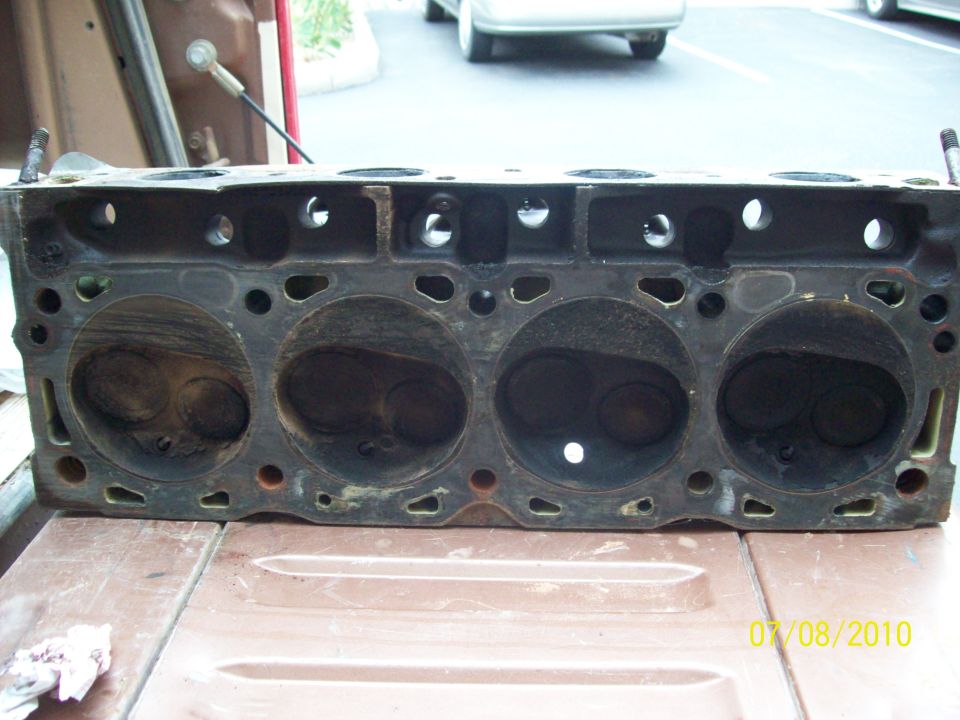 Engine cylinder head with four cylinders visible