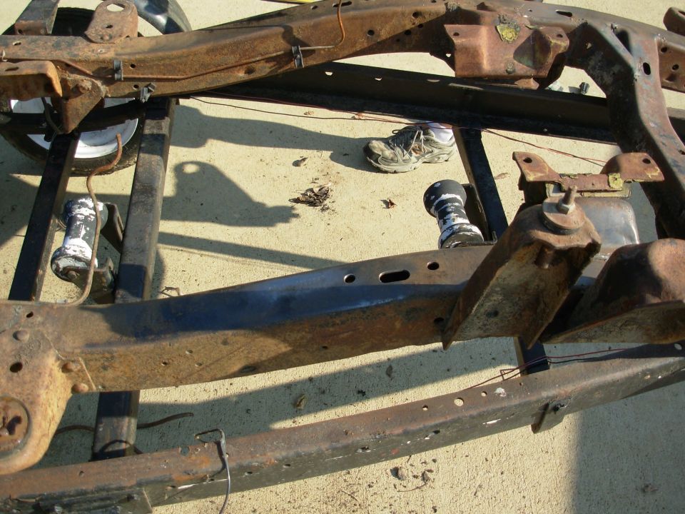SOLD Apr22 The VIN stamping is in the clean spot where the R shock tower's shadow crosses the near frame rail.

I've started cleaning it so I can take some measurements. I'm also removing all the junk parts & welded-on crap.