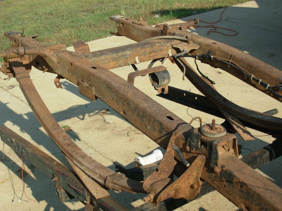 I've started cleaning it so I can take some measurements. I'm also removing all the junk parts & welded-on crap.