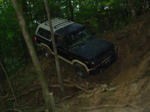 1983 Ford Bronco - This 1983 Ford Bronco navigates a steep, wooded off-road trail.