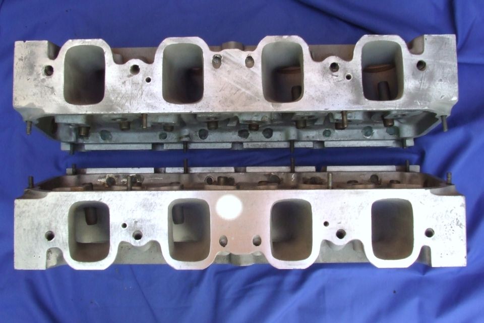 Pair of aluminum V8 engine cylinder heads, possibly Ford