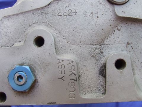 1973 Ford Mustang - Metal engine component with visible casting and assembly numbers, part of a larger vehicle system.