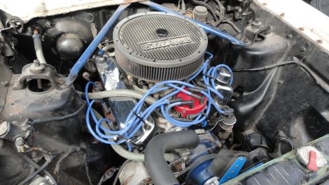 1964 Ford Fairlane - Engine bay details, including blue spark plug wires and an Edelbrock air cleaner, are visible.