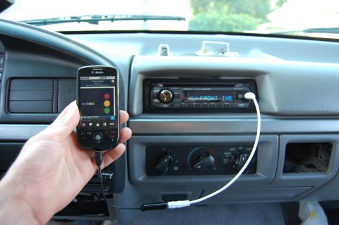 1994 Ford Bronco - A phone is connected to the stereo of a 1992 Ford Bronco's interior.